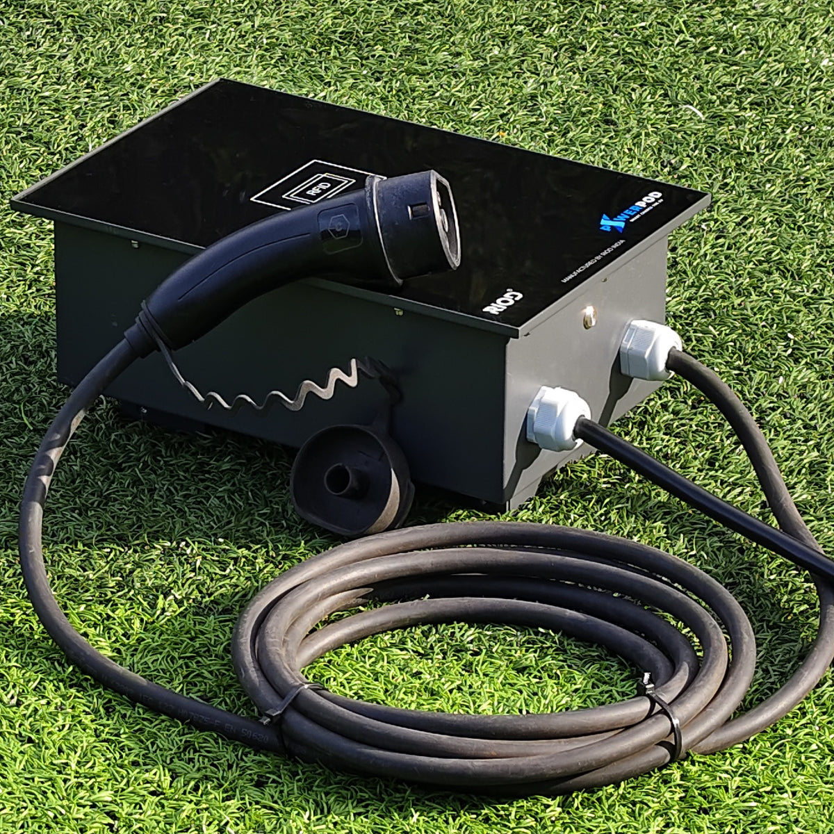 RIOD PowerPod AC EV charger showing cable glands, connector holster and Type 2 charging gun